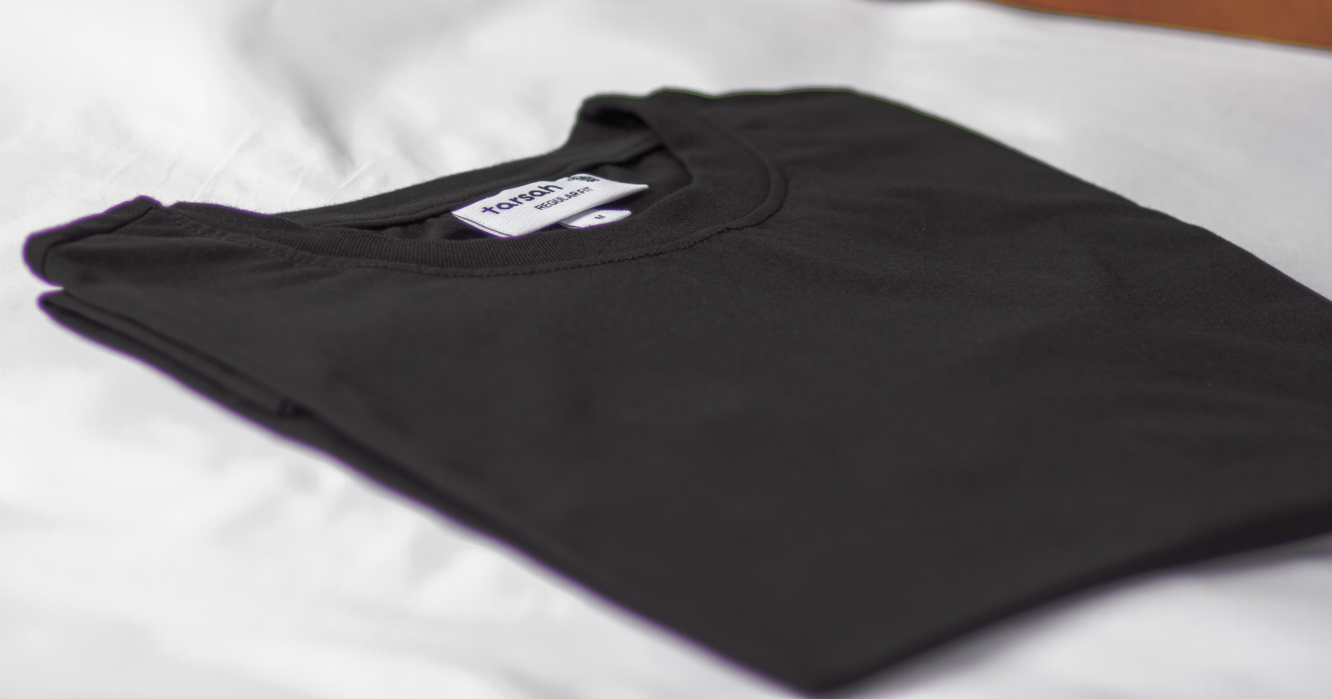 black folded laying camera